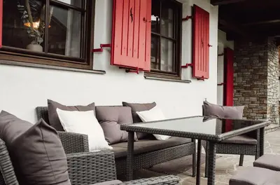 Ein Sitzbereich in der Unterkunft Chalet Alpenglück