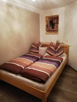 Ein Bett oder Betten in einem Zimmer der Unterkunft Ferienwohnung Kreidl Ilse