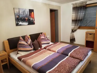 Ein Bett oder Betten in einem Zimmer der Unterkunft Ferienwohnung Kreidl Ilse