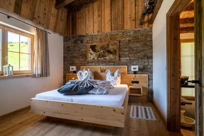 Ein Bett oder Betten in einem Zimmer der Unterkunft Wochenbrunner Chalets
