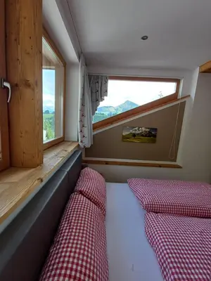 Ein Bett oder Betten in einem Zimmer der Unterkunft Brandhof
