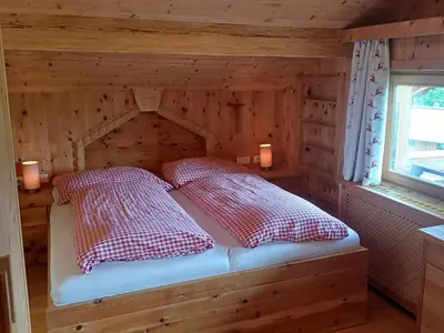 Ein Bett oder Betten in einem Zimmer der Unterkunft Brandhof
