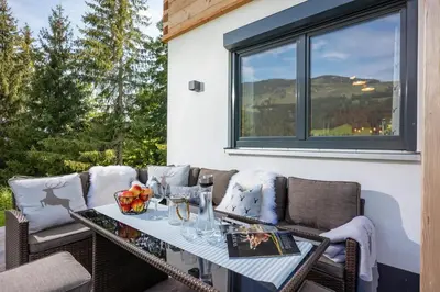 Ein Sitzbereich in der Unterkunft Chalet Alpenherz