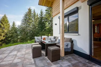 Ein Sitzbereich in der Unterkunft Chalet Alpenherz