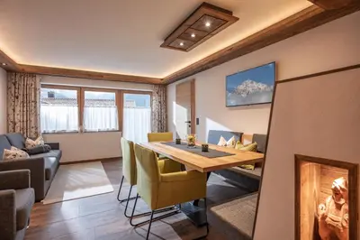 Ein Sitzbereich in der Unterkunft Appartements Rosengarten