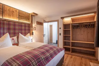 Ein Bett oder Betten in einem Zimmer der Unterkunft Appartements Rosengarten
