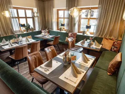 Ein Sitzbereich in der Unterkunft La Pasta Hotel Restaurant