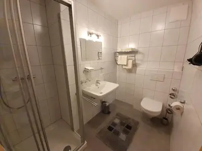 Ein Badezimmer in der Unterkunft Eichenhof