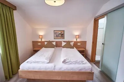 Ein Bett oder Betten in einem Zimmer der Unterkunft Appartements Pungg
