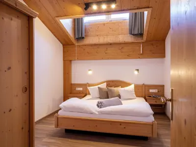 Ein Bett oder Betten in einem Zimmer der Unterkunft Apart Denise