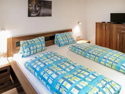 Ein Bett oder Betten in einem Zimmer der Unterkunft Apartment Gitti by Interhome