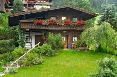 Ein Garten an der Unterkunft Ferienhäuser Reither Almen