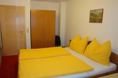 Ein Bett oder Betten in einem Zimmer der Unterkunft Appartementhaus Fuchs Christian