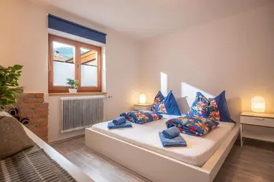 Ein Bett oder Betten in einem Zimmer der Unterkunft Salven-Lodge