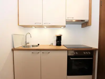 Küche/Küchenzeile in der Unterkunft Apartment Römerhof-3 by Interhome