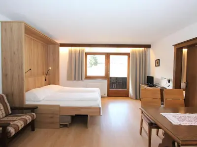 Ein Bett oder Betten in einem Zimmer der Unterkunft Apartment Römerhof-5 by Interhome