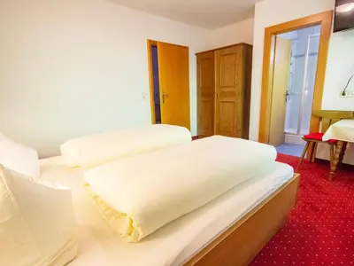 Ein Bett oder Betten in einem Zimmer der Unterkunft Apartment Brandegg Top 3 by Interhome