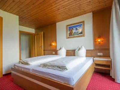 Ein Bett oder Betten in einem Zimmer der Unterkunft Apartment Brandegg Top 3 by Interhome