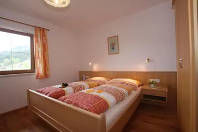 Ein Bett oder Betten in einem Zimmer der Unterkunft Bauernhof Hundbichl