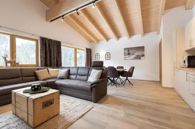 Ein Sitzbereich in der Unterkunft Alpenhof Chalets