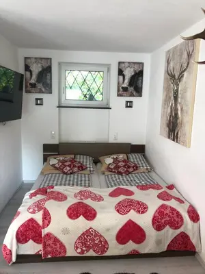 Ein Bett oder Betten in einem Zimmer der Unterkunft Posthof 33