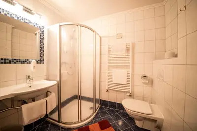 Ein Badezimmer in der Unterkunft Hotel Garni Wolfgang