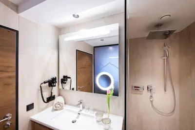 Ein Badezimmer in der Unterkunft Wohlfühlhotel Innertalerhof