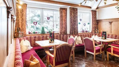 Ein Sitzbereich in der Unterkunft Wohlfühlhotel Innertalerhof
