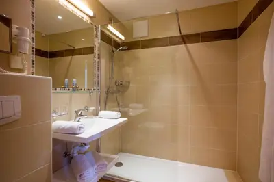 Ein Badezimmer in der Unterkunft Pension Zillertal