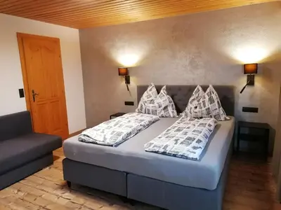 Ein Bett oder Betten in einem Zimmer der Unterkunft Ferienwohnung Martin