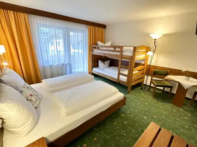 Ein Bett oder Betten in einem Zimmer der Unterkunft Sportpension Christina by PiaundDirk