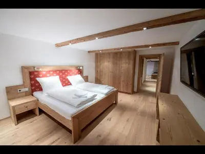 Ein Bett oder Betten in einem Zimmer der Unterkunft Appartements Pöllhof