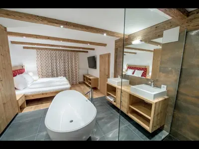 Ein Bett oder Betten in einem Zimmer der Unterkunft Appartements Pöllhof