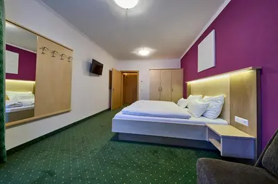 Ein Bett oder Betten in einem Zimmer der Unterkunft The Poolhouse Boutique Lodge