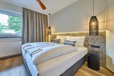 Ein Bett oder Betten in einem Zimmer der Unterkunft The Poolhouse Boutique Lodge
