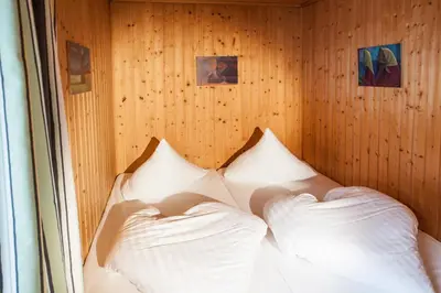 Ein Bett oder Betten in einem Zimmer der Unterkunft Chalet Appartement Alpenherz
