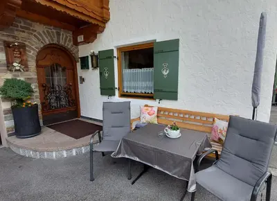 Ein Sitzbereich in der Unterkunft Gästehaus Christoph