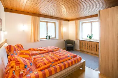 Ein Bett oder Betten in einem Zimmer der Unterkunft Ferienwohnung Schmid