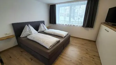 Ein Bett oder Betten in einem Zimmer der Unterkunft Ferienwohnung Graber