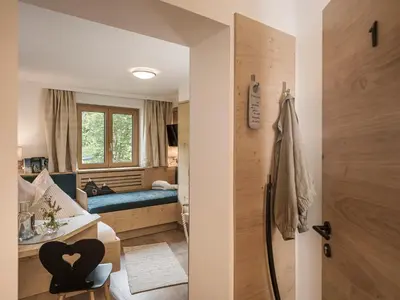 Ein Bett oder Betten in einem Zimmer der Unterkunft Café Pension Koller