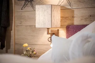 Ein Bett oder Betten in einem Zimmer der Unterkunft Café Pension Koller