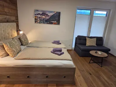 Ein Bett oder Betten in einem Zimmer der Unterkunft Appartement Steidl