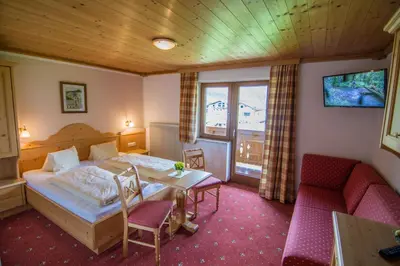 Ein Bett oder Betten in einem Zimmer der Unterkunft Pension Samerhof
