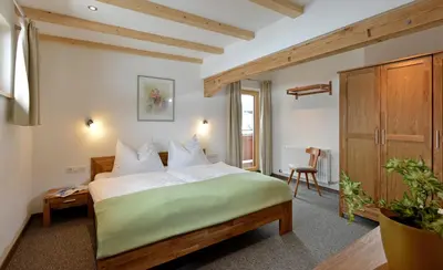 Ein Bett oder Betten in einem Zimmer der Unterkunft Haus Erika