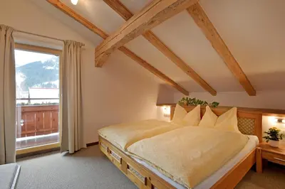 Ein Bett oder Betten in einem Zimmer der Unterkunft Haus Erika