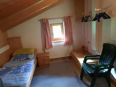 Ein Bett oder Betten in einem Zimmer der Unterkunft LORA