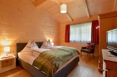 Ein Bett oder Betten in einem Zimmer der Unterkunft Ferienwohnung Lechenhof