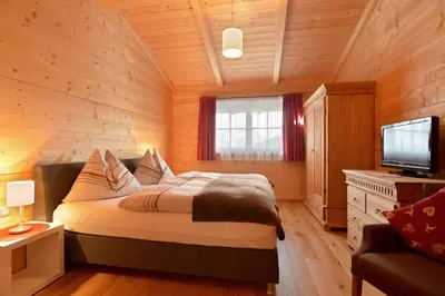 Ein Bett oder Betten in einem Zimmer der Unterkunft Ferienwohnung Lechenhof