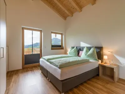 Ein Bett oder Betten in einem Zimmer der Unterkunft Ferienwohnung Obersteintal