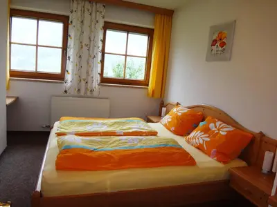 Ein Bett oder Betten in einem Zimmer der Unterkunft ANDREA